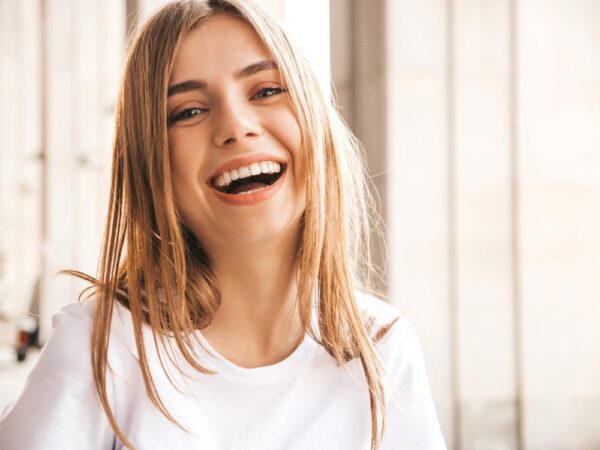 Young woman smiling confidently after orthodontics treatment in Prescott, AZ