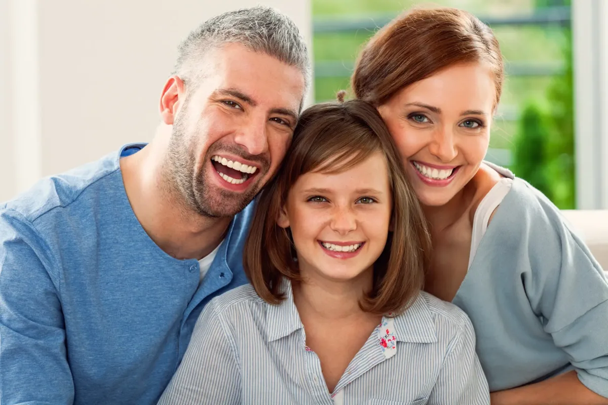 Family Orthodontics Prescott AZ Happy family smiling together after orthodontics treatment in Prescott, AZ