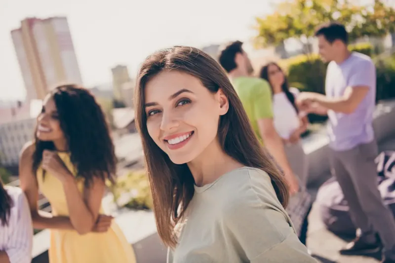 Young woman smiling confidently after visiting an Orthodontics Office in Prescott Valley, AZ